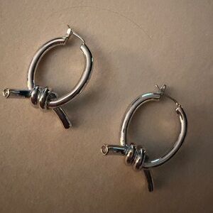 Henri Bendel Silver Knot Design Earrings